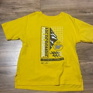 Yellow graphic tee shirt